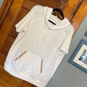 Cute short sleeve sweatshirt with rainbows for details!